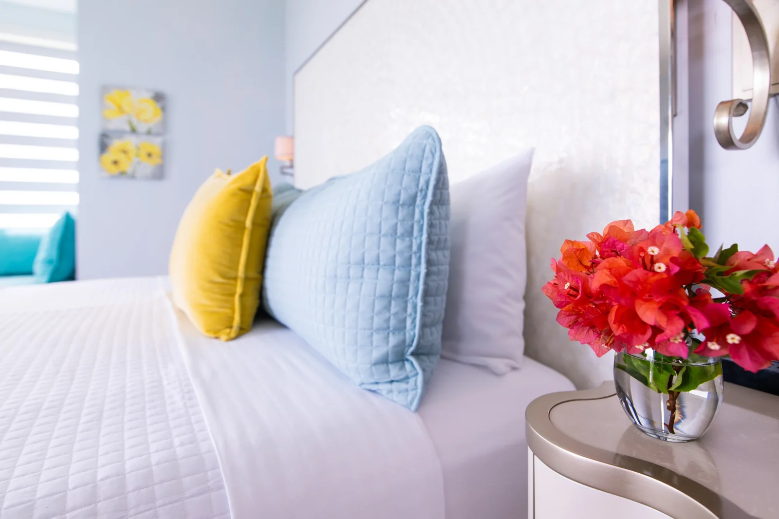 Bedroom pillows and fresh flowers